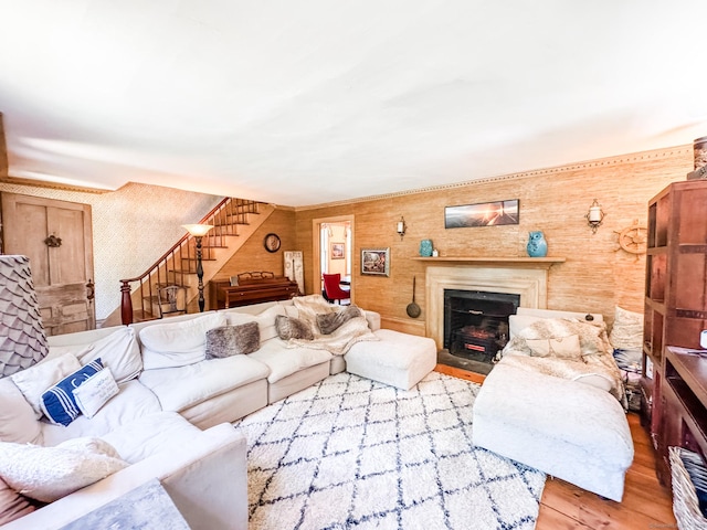 101 Child Hill Rd, Woodstock, CT 06281 - living area featuring stairs, light wood-type flooring, a fireplace with flush hearth, and wallpapered walls