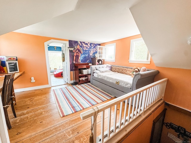101 Child Hill Rd, Woodstock, CT 06281 - living area with hardwood / wood-style flooring, vaulted ceiling, and baseboards