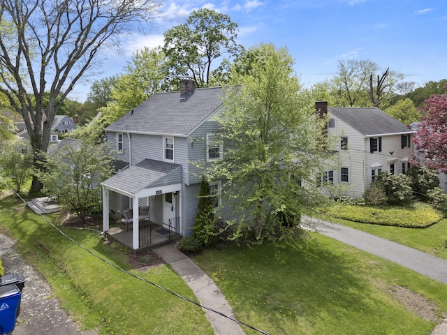 101 White Ave, West Hartford, CT 06119 - view of front of home featuring a chimney, a front yard, a porch, and a shingled roof