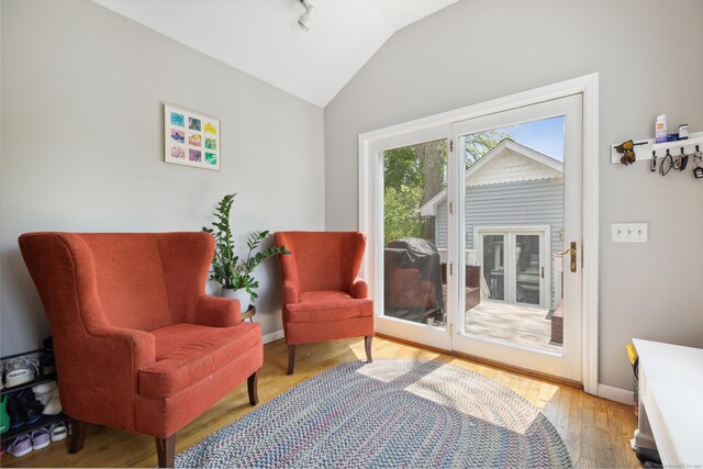 101 White Ave, West Hartford, CT 06119 - sitting room featuring lofted ceiling, light wood-type flooring, and baseboards