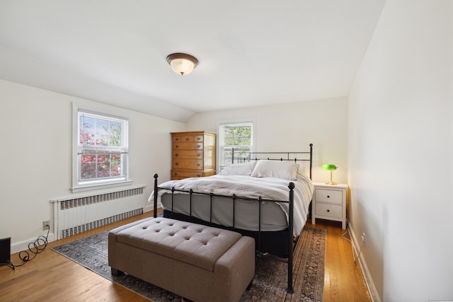 101 White Ave, West Hartford, CT 06119 - bedroom featuring radiator, wood finished floors, and baseboards