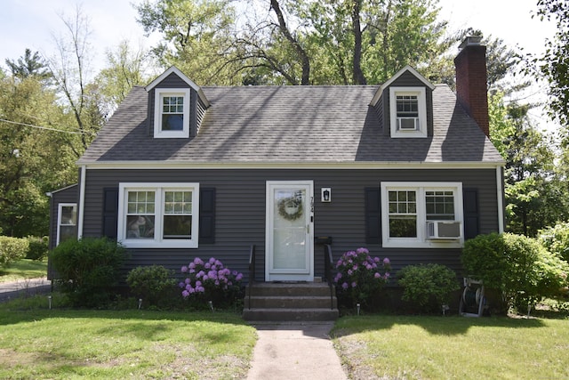 794 Center St, Manchester, CT 06040 - cape cod-style house featuring a chimney, a front yard, cooling unit, and a shingled roof