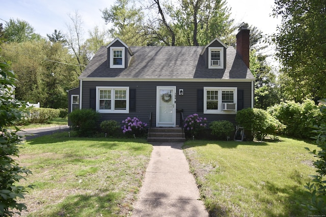 794 Center St, Manchester, CT 06040 - cape cod-style house featuring a chimney, a front yard, cooling unit, and a shingled roof