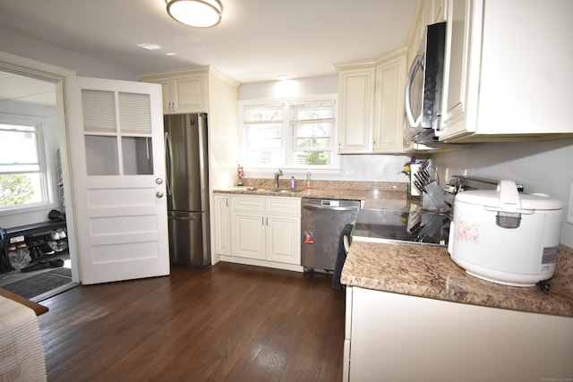 794 Center St, Manchester, CT 06040 - kitchen featuring appliances with stainless steel finishes, dark wood-style floors, plenty of natural light, and a sink