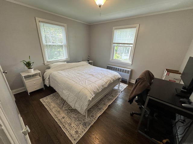 794 Center St, Manchester, CT 06040 - bedroom featuring radiator heating unit, dark wood-style floors, crown molding, and baseboards