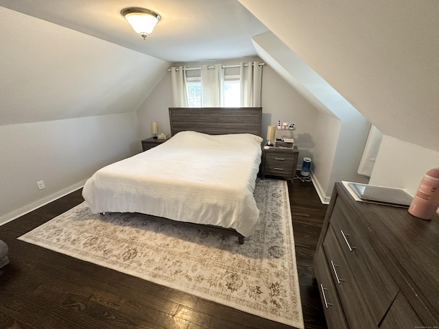794 Center St, Manchester, CT 06040 - bedroom with vaulted ceiling, dark wood-style flooring, and baseboards