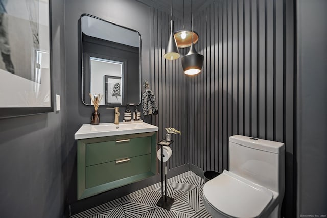 31 Poverty Hollow Rd, Newtown, CT 06470 - half bath featuring vanity, toilet, and tile patterned floors