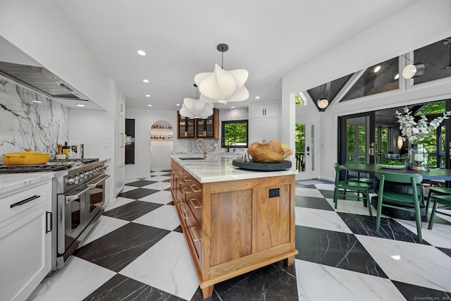31 Poverty Hollow Rd, Newtown, CT 06470 - kitchen with double oven range, a sink, tasteful backsplash, wall chimney exhaust hood, and recessed lighting
