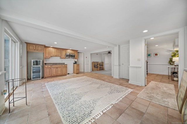 31 Poverty Hollow Rd, Newtown, CT 06470 - kitchen featuring stainless steel microwave, a ceiling fan, recessed lighting, light tile patterned floors, and wine cooler