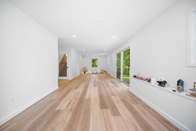31 Poverty Hollow Rd, Newtown, CT 06470 - spare room featuring light wood finished floors, baseboards, recessed lighting, and stairs