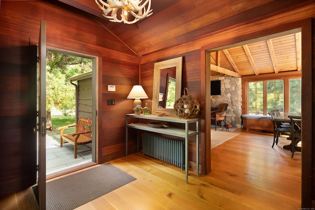 20 Kirk Rd, Sharon, CT 06796 - foyer entrance with radiator, vaulted ceiling, a chandelier, wooden ceiling, and wood finished floors
