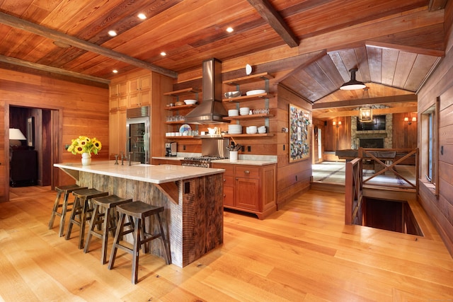 20 Kirk Rd, Sharon, CT 06796 - kitchen with island exhaust hood, wooden walls, wooden ceiling, open shelves, and beam ceiling