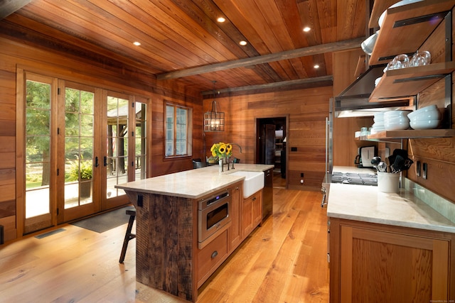 20 Kirk Rd, Sharon, CT 06796 - kitchen with a sink, open shelves, wooden ceiling, wood walls, and french doors