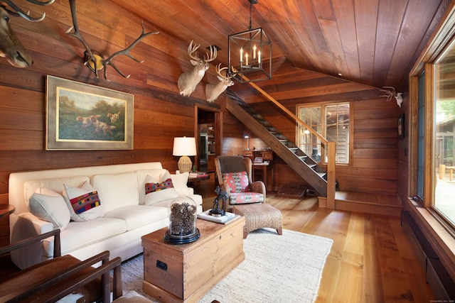 20 Kirk Rd, Sharon, CT 06796 - living room featuring wood walls, vaulted ceiling, wood ceiling, plenty of natural light, and wood finished floors