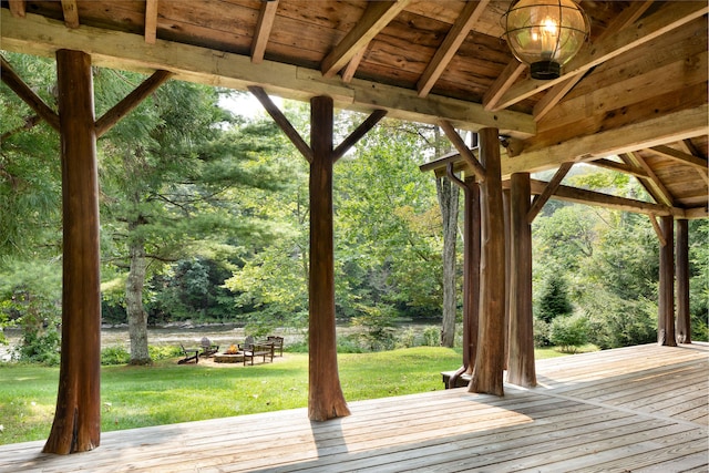 20 Kirk Rd, Sharon, CT 06796 - wooden terrace with a fire pit, a yard, and a view of trees