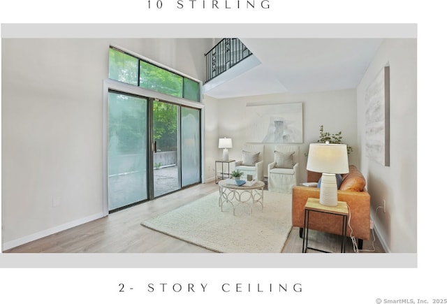 10 Stirling Ct, Middletown, CT 06457 - living room with wood finished floors and baseboards