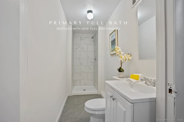 10 Stirling Ct, Middletown, CT 06457 - bathroom featuring marble finish floors, baseboards, vanity, a stall shower, and toilet