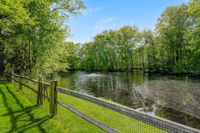 water view featuring fence