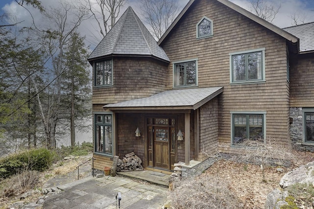 shingle-style home with a shingled roof