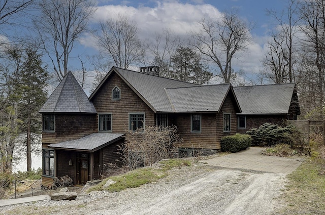 shingle-style home with a shingled roof