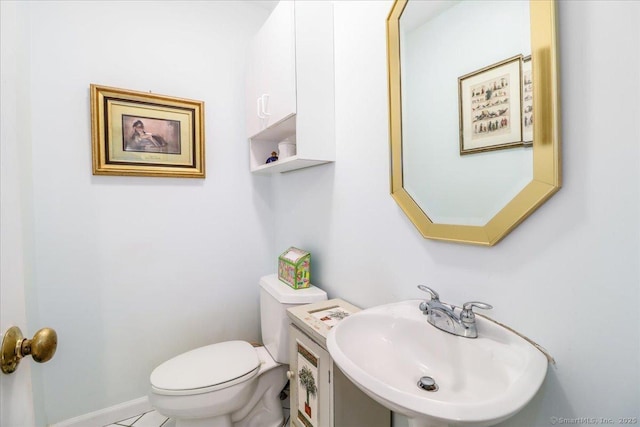 bathroom with a sink and toilet
