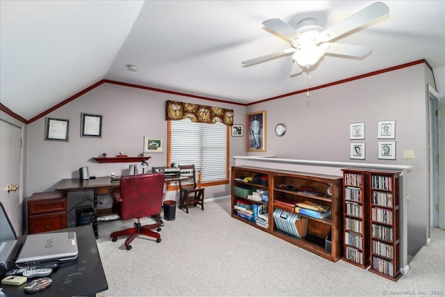 office space featuring carpet, lofted ceiling, ceiling fan, crown molding, and baseboards