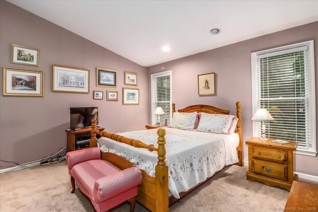 bedroom with carpet floors, lofted ceiling, recessed lighting, and baseboards