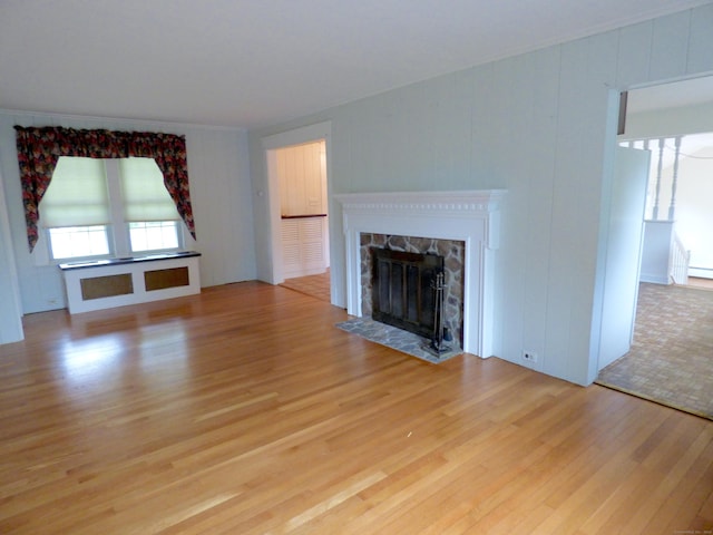 992 Ridge Rd, Wethersfield, CT 06109 - unfurnished living room featuring light wood finished floors and a fireplace