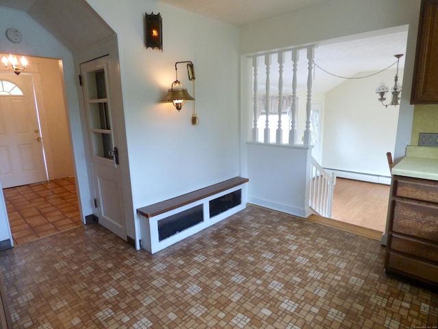 992 Ridge Rd, Wethersfield, CT 06109 - foyer entrance with a chandelier, baseboard heating, and vaulted ceiling
