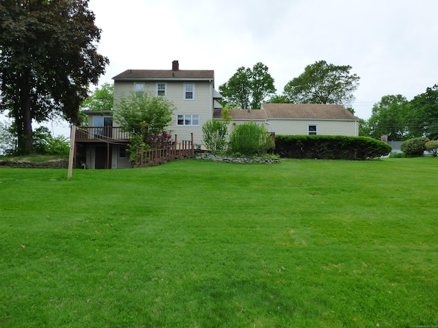 992 Ridge Rd, Wethersfield, CT 06109 - view of grassy yard featuring a wooden deck