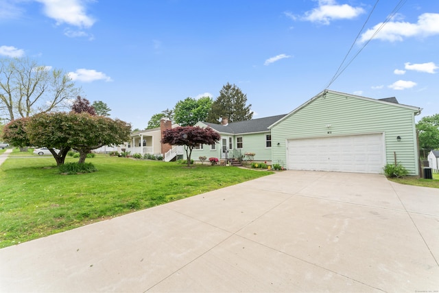 315 Prospect St, Wethersfield, CT 06109 - view of front of property featuring a garage, driveway, a front yard, and a chimney