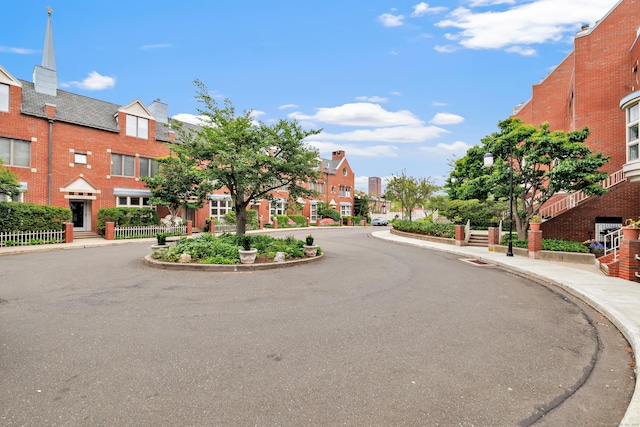 42 Temple Ct Unit 42, New Haven, CT 06511 - view of asphalt street featuring curbs, a residential view, sidewalks, and street lights