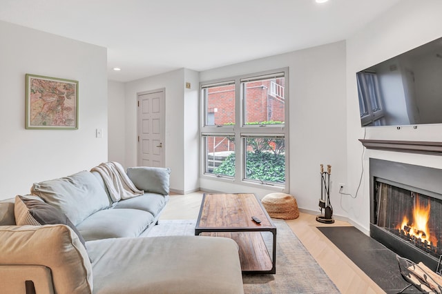 42 Temple Ct Unit 42, New Haven, CT 06511 - living area featuring recessed lighting, a fireplace with flush hearth, wood finished floors, and baseboards