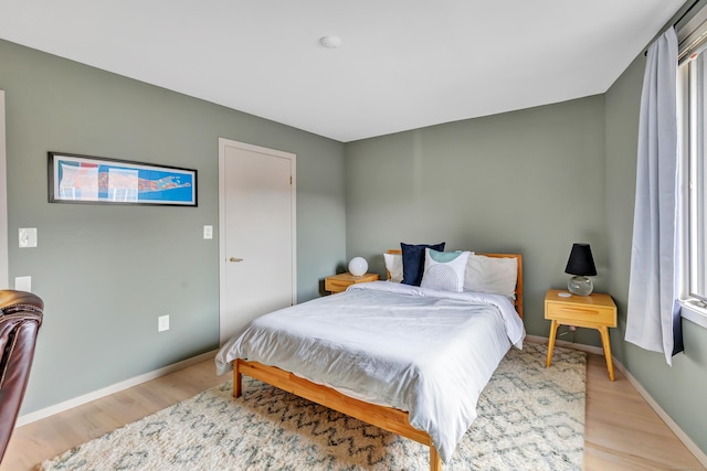 42 Temple Ct Unit 42, New Haven, CT 06511 - bedroom featuring light wood-type flooring and baseboards
