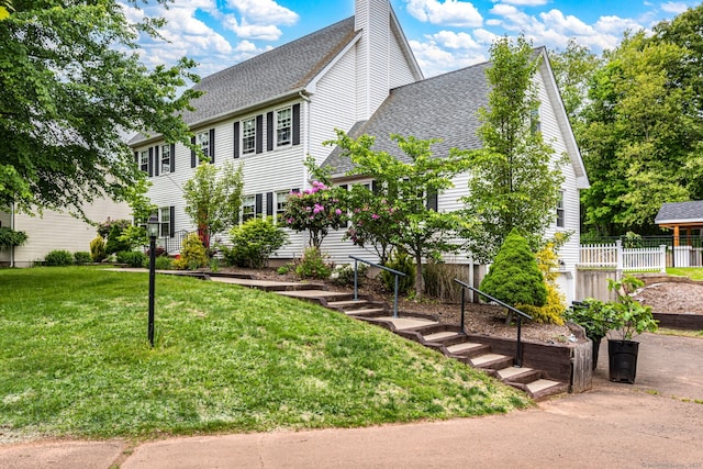 57 Harvard Ct, Middletown, CT 06457 - colonial inspired home featuring roof with shingles and a chimney