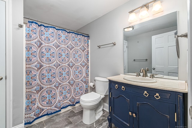 57 Harvard Ct, Middletown, CT 06457 - full bath featuring vanity, toilet, curtained shower, and baseboards