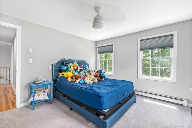 57 Harvard Ct, Middletown, CT 06457 - bedroom with a baseboard radiator, carpet floors, baseboards, and a ceiling fan