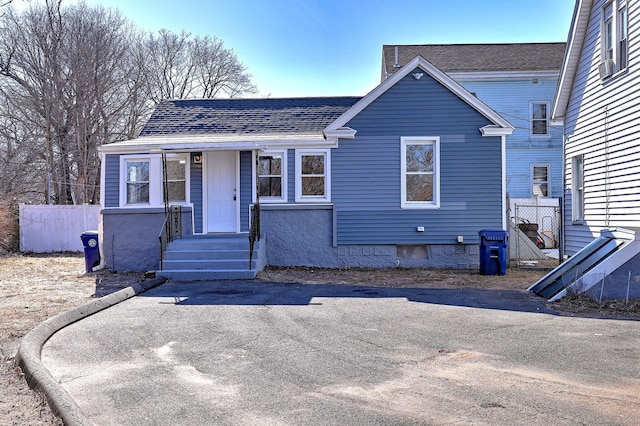 167 Gilbert St, West Haven, CT 06516 - view of front of property featuring roof with shingles and fence