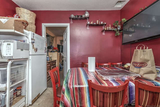 167 Gilbert St, West Haven, CT 06516 - dining room with tile patterned floors
