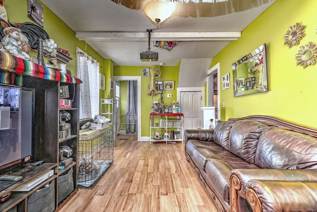 167 Gilbert St, West Haven, CT 06516 - living area with beamed ceiling and wood finished floors