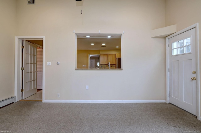 145 Casmir Dr, Fairfield, CT 06825 - carpeted foyer entrance with baseboards, baseboard heating, and recessed lighting