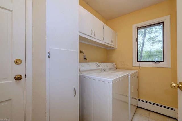 145 Casmir Dr, Fairfield, CT 06825 - clothes washing area featuring washing machine and clothes dryer, baseboard heating, cabinet space, and light tile patterned flooring