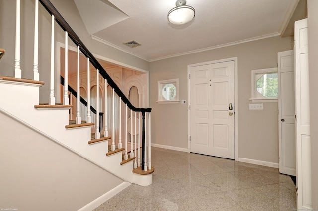 145 Casmir Dr, Fairfield, CT 06825 - entryway featuring baseboards, granite tiled floors, ornamental molding, and stairway