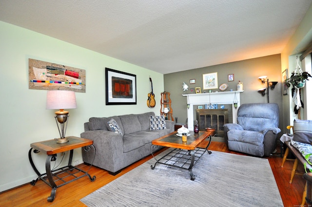 3 Mountain View Dr, Rocky Hill, CT 06067 - living area featuring wood finished floors and a fireplace
