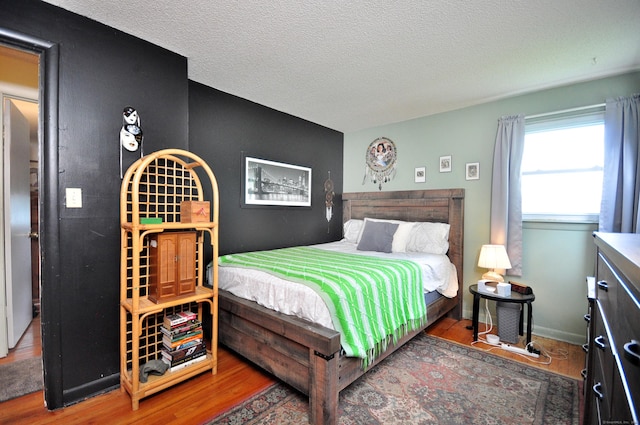 3 Mountain View Dr, Rocky Hill, CT 06067 - bedroom featuring wood finished floors, a textured ceiling, and baseboards
