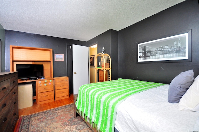 3 Mountain View Dr, Rocky Hill, CT 06067 - bedroom with wood finished floors and a textured ceiling