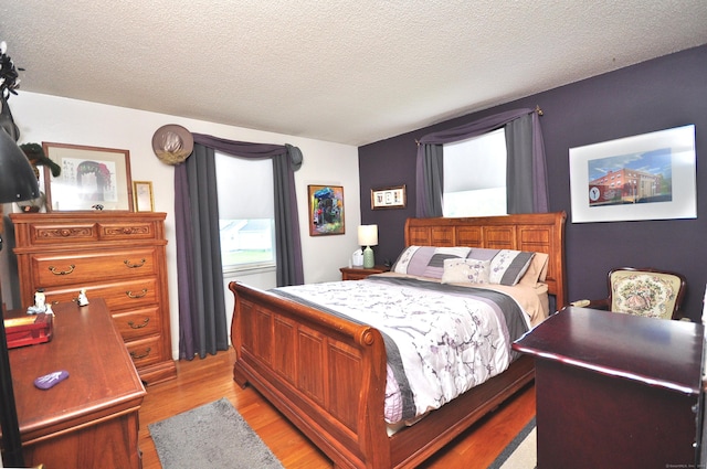 3 Mountain View Dr, Rocky Hill, CT 06067 - bedroom with light wood-style flooring and a textured ceiling
