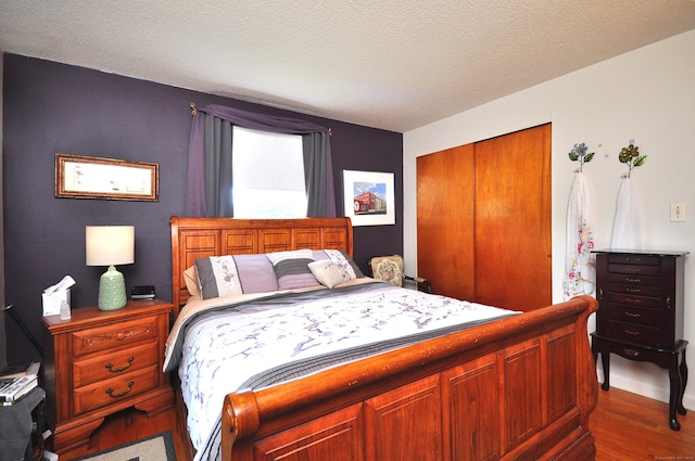 3 Mountain View Dr, Rocky Hill, CT 06067 - bedroom with a closet, wood finished floors, and a textured ceiling