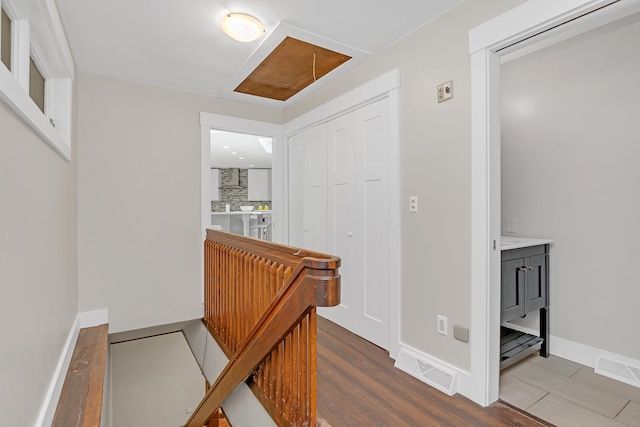 97 W Rd, Marlborough, CT 06447 - hall with wood finished floors, attic access, and baseboards