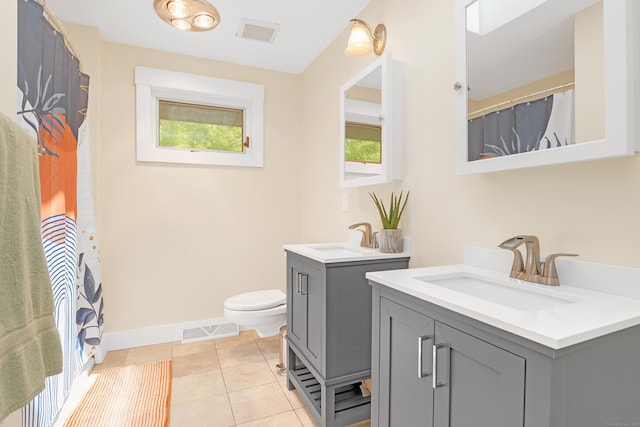 97 W Rd, Marlborough, CT 06447 - full bathroom featuring healthy amount of natural light, two vanities, baseboards, and toilet